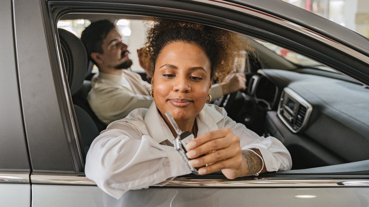 Woman Holding Car Keys | Goodwill Car Donations