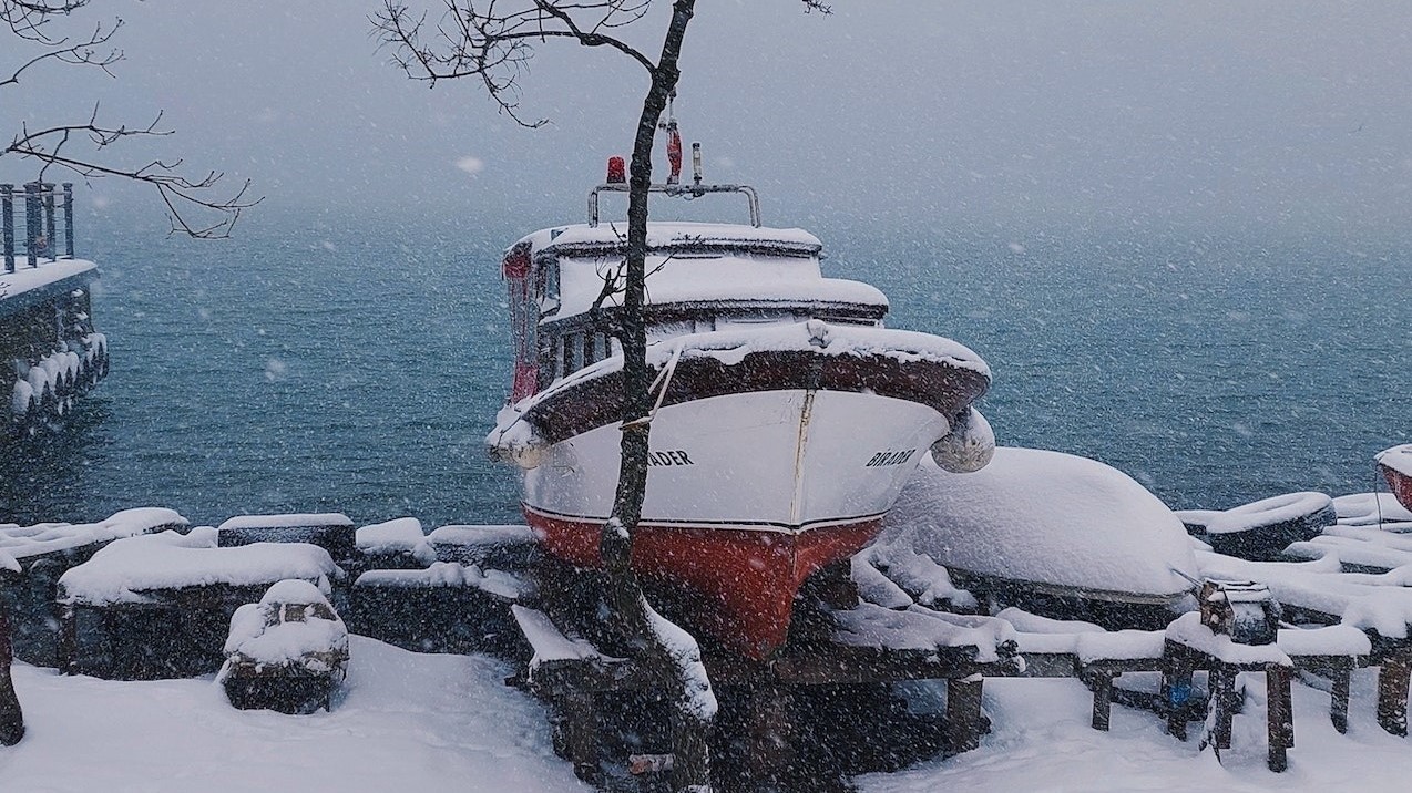 Boat docked during winter | Goodwill Car Donations