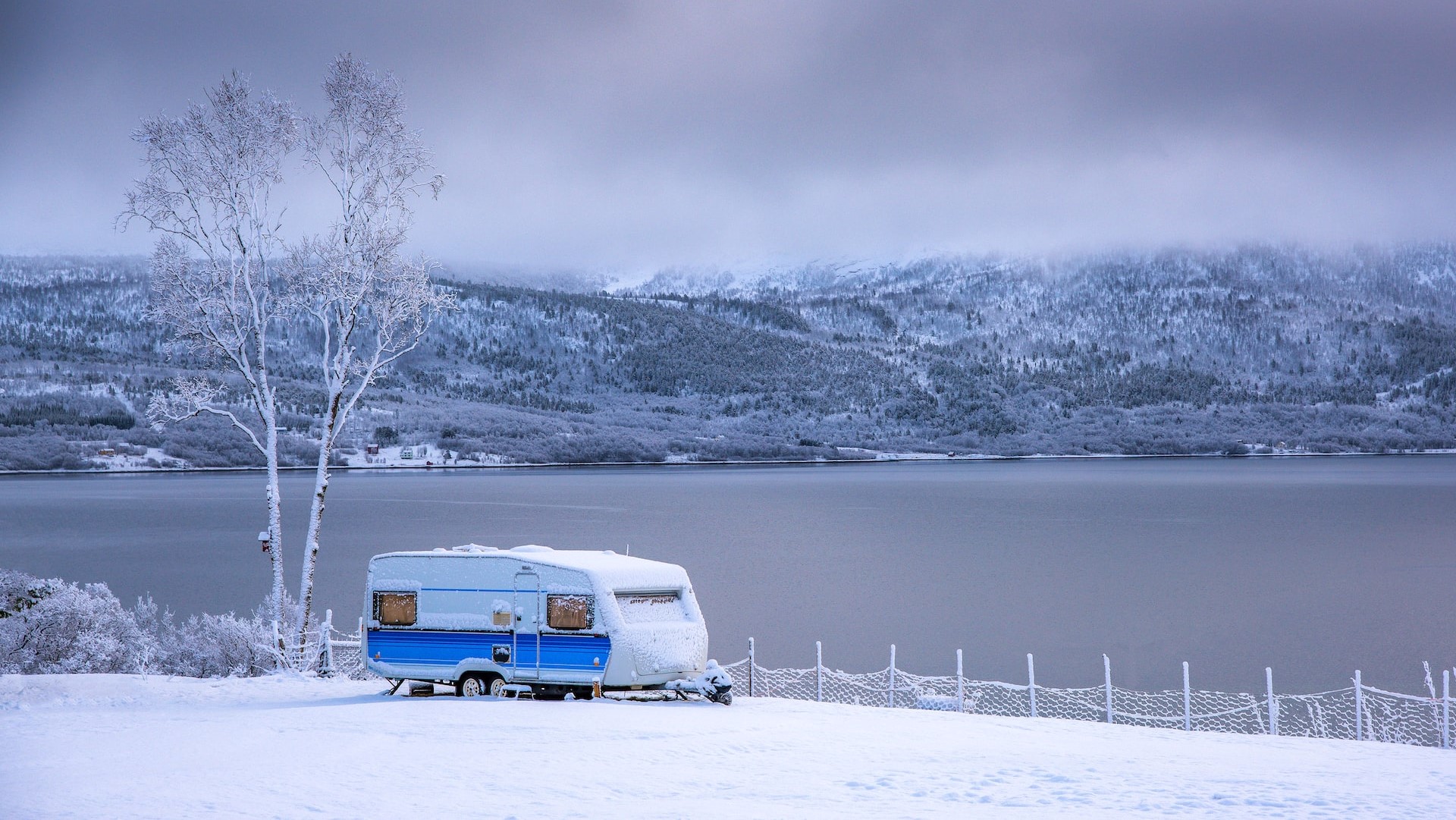 RV parked near lake during winter | Goodwill Car Donations