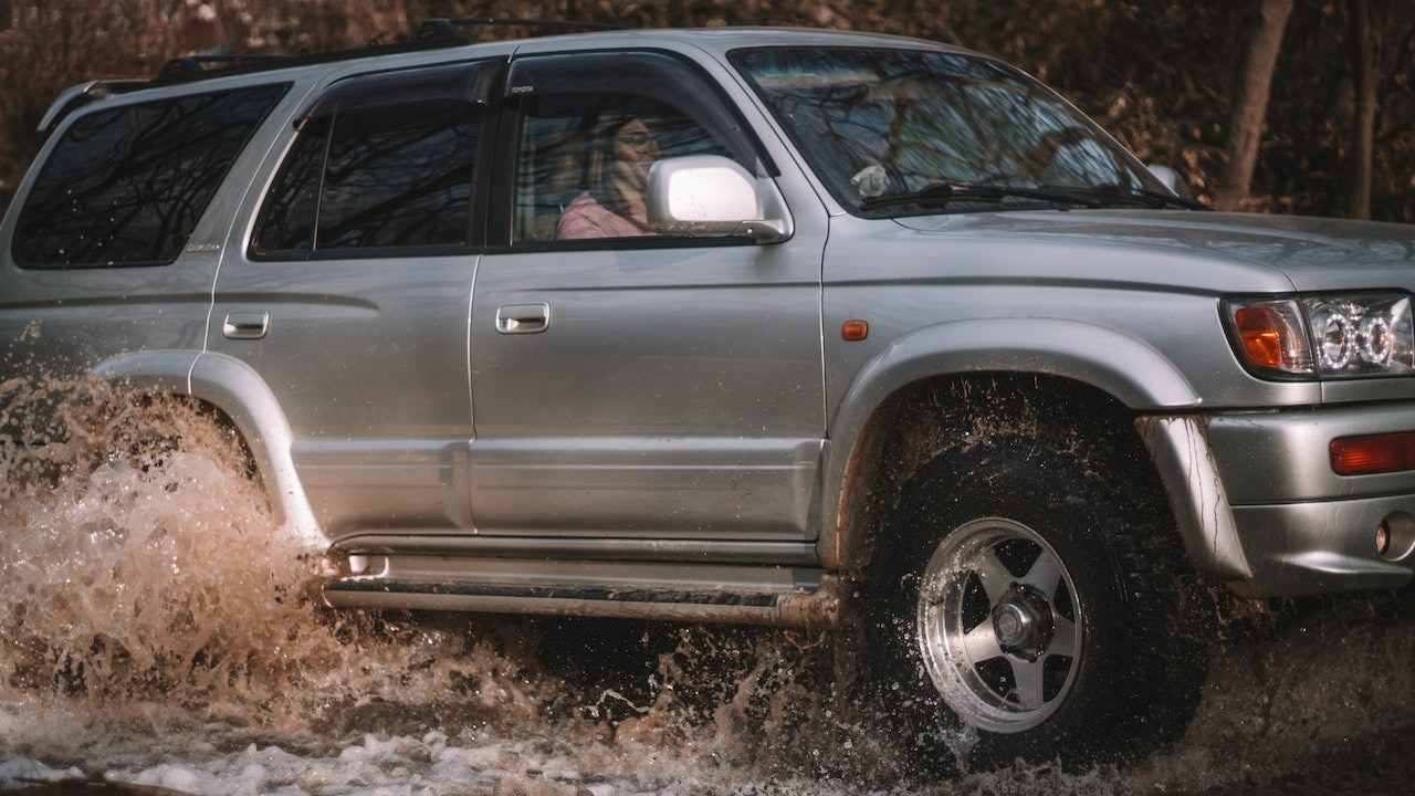 Silver SUV Driving on Off Road | Goodwill Car Donations