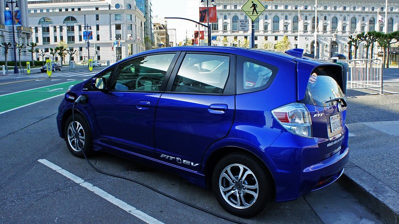 Honda Fit EV at a public charging station in front of San Francisco City Hall | Goodwill Car Donations