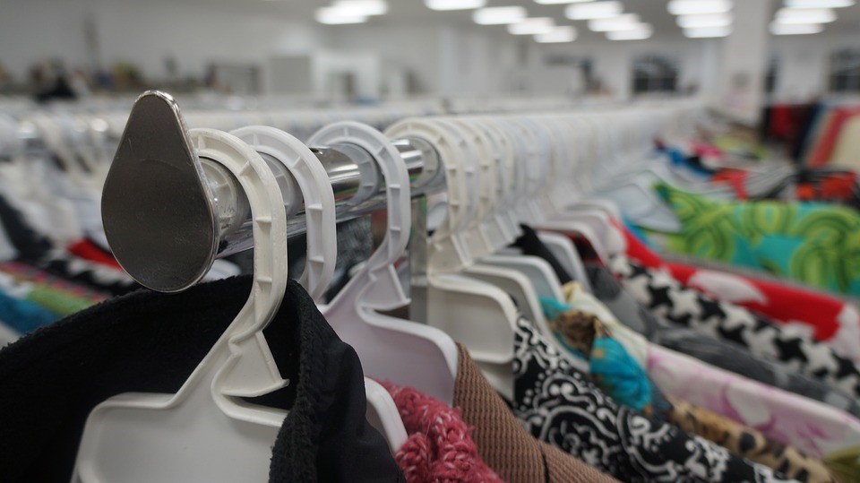 Hanged Clothes in a Thrift Store | Goodwill Car Donations
