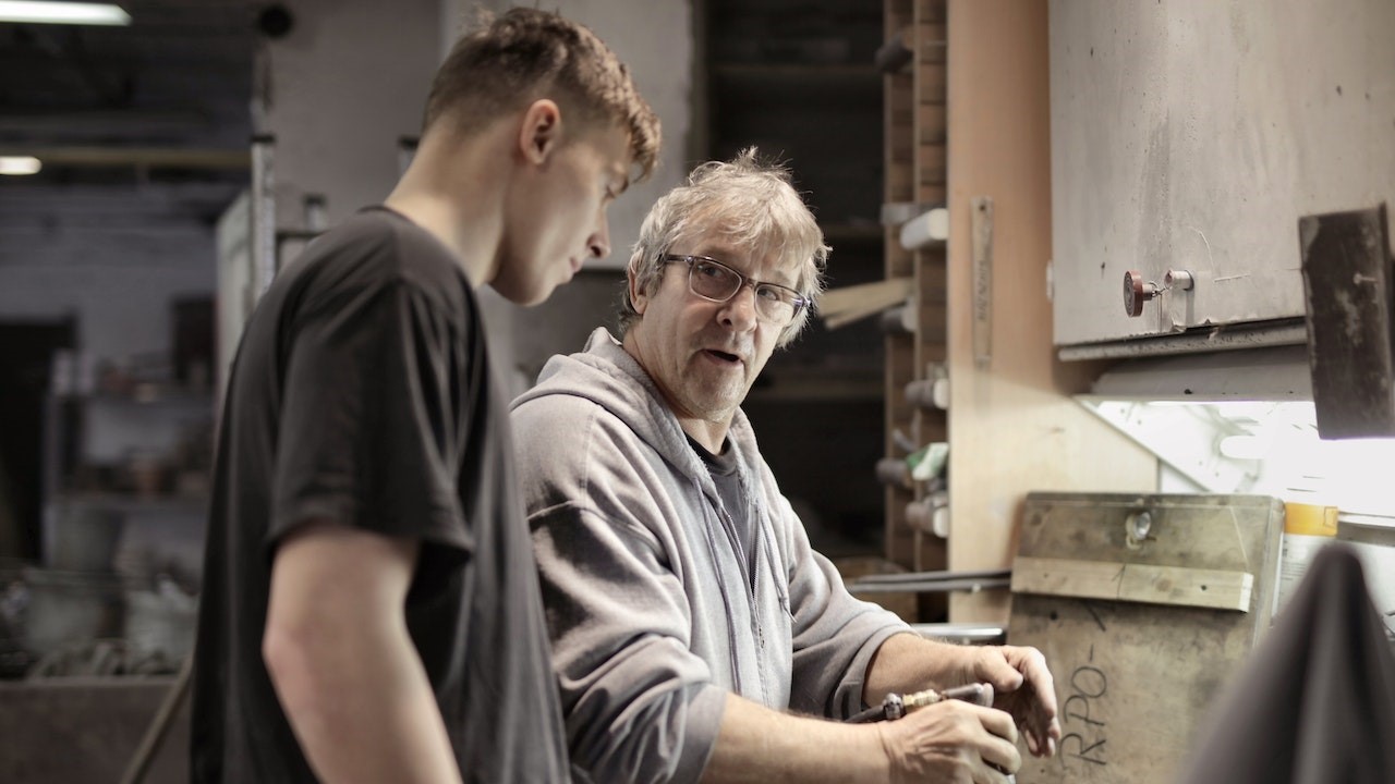 Workers Handling Detail in Workshop | Goodwill Car Donations