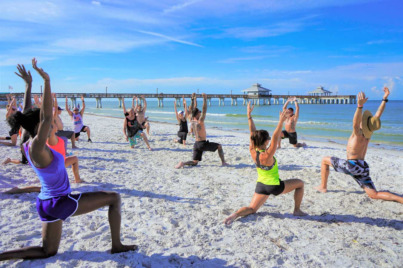 Group Yoga at a Beach | Goodwill Car Donations