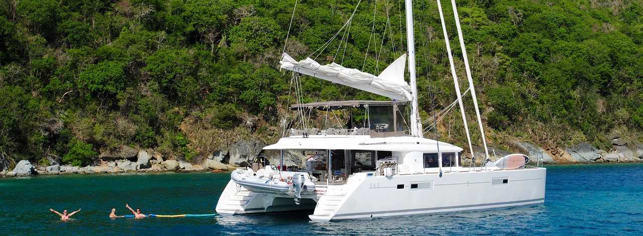 Catamaran Sitting on Waters | Goodwill Car Donations