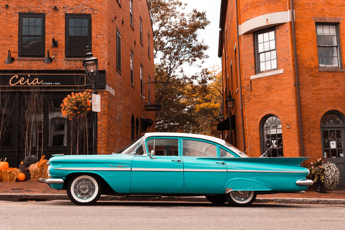 Teal-Colored Classic Sedan Parked Beside a Street | Goodwill Car Donations