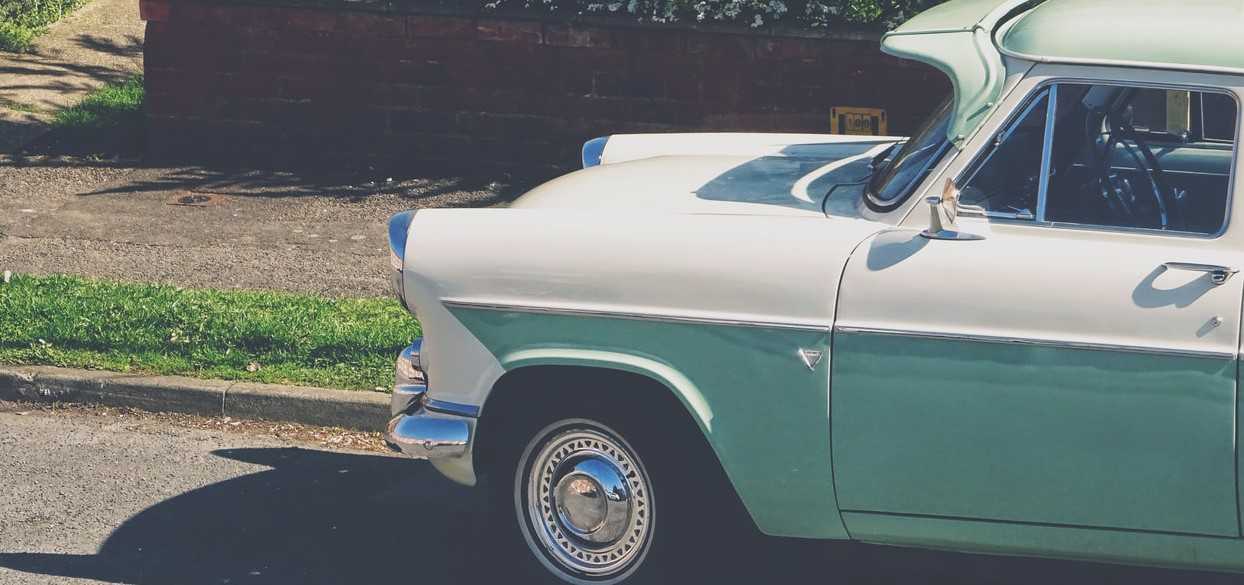 White and Teal Colored Vintage Car in Great Falls, Montana | Goodwill Car Donations