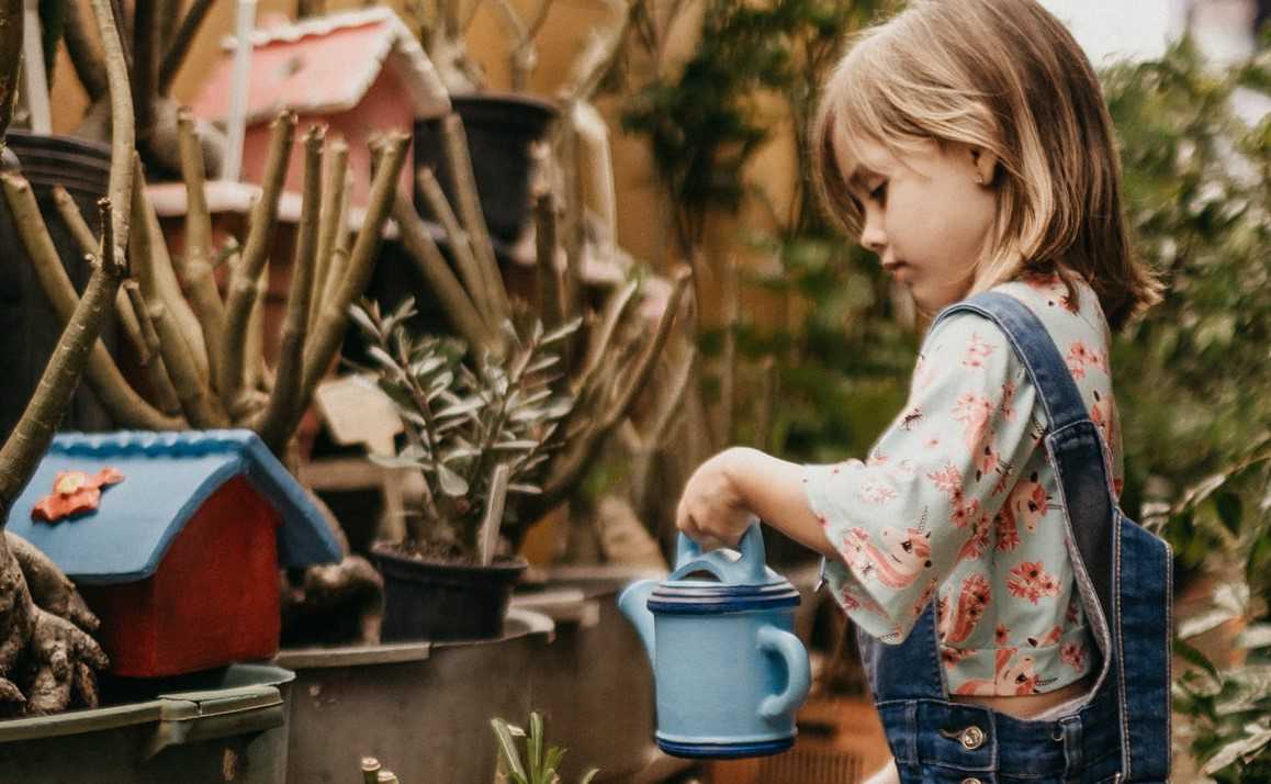 Little Girl Gardening | Goodwill Car Donations