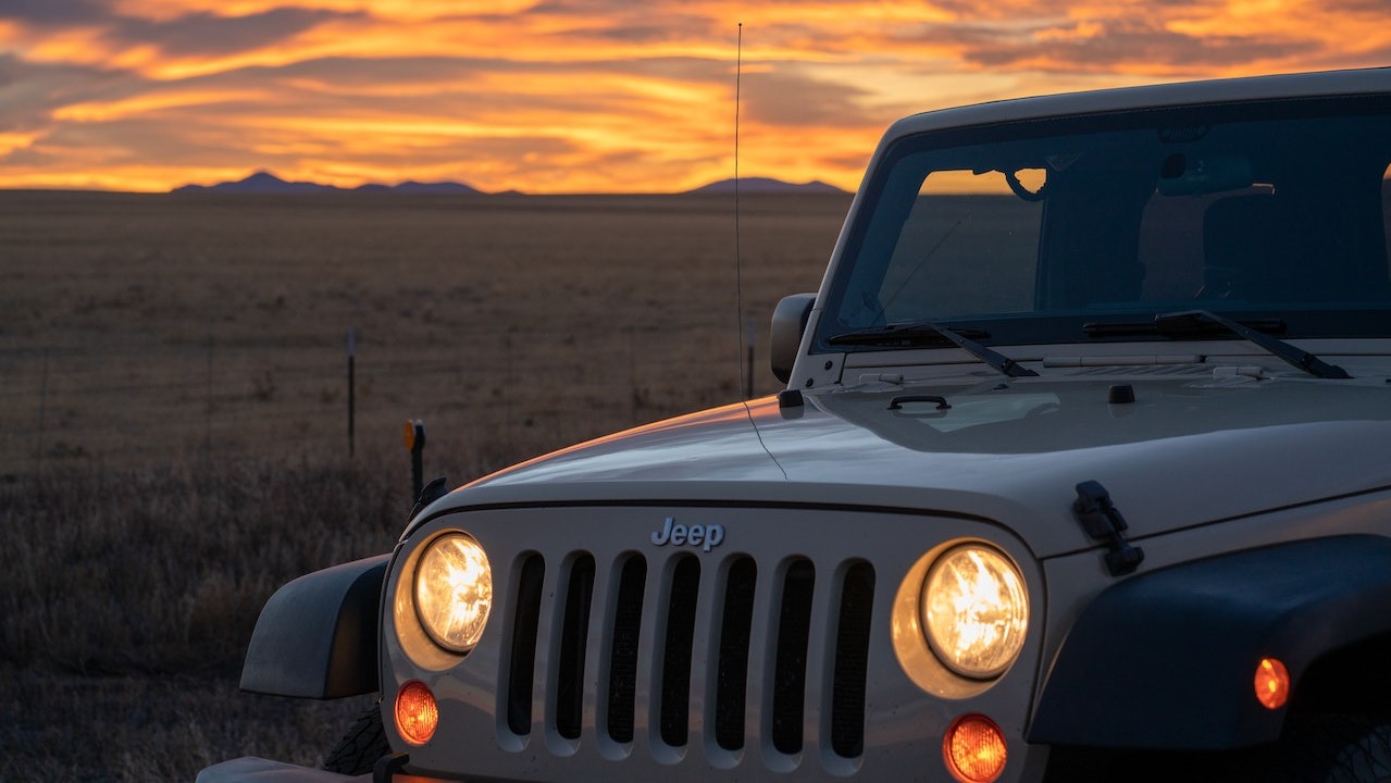 A Jeep Wrangler Parked Near the Field | Goodwill Car Donations