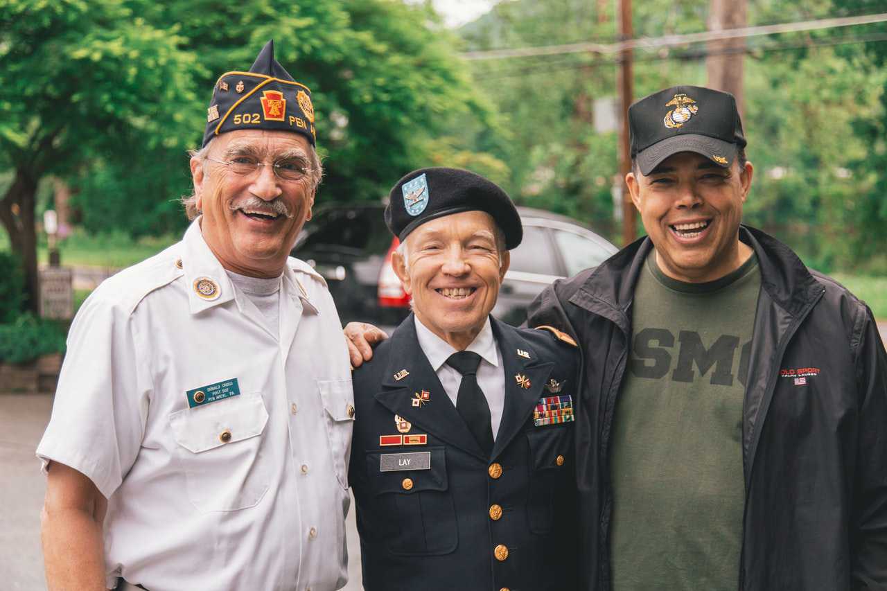 Three US Veterans Smiling | Goodwill Car Donations