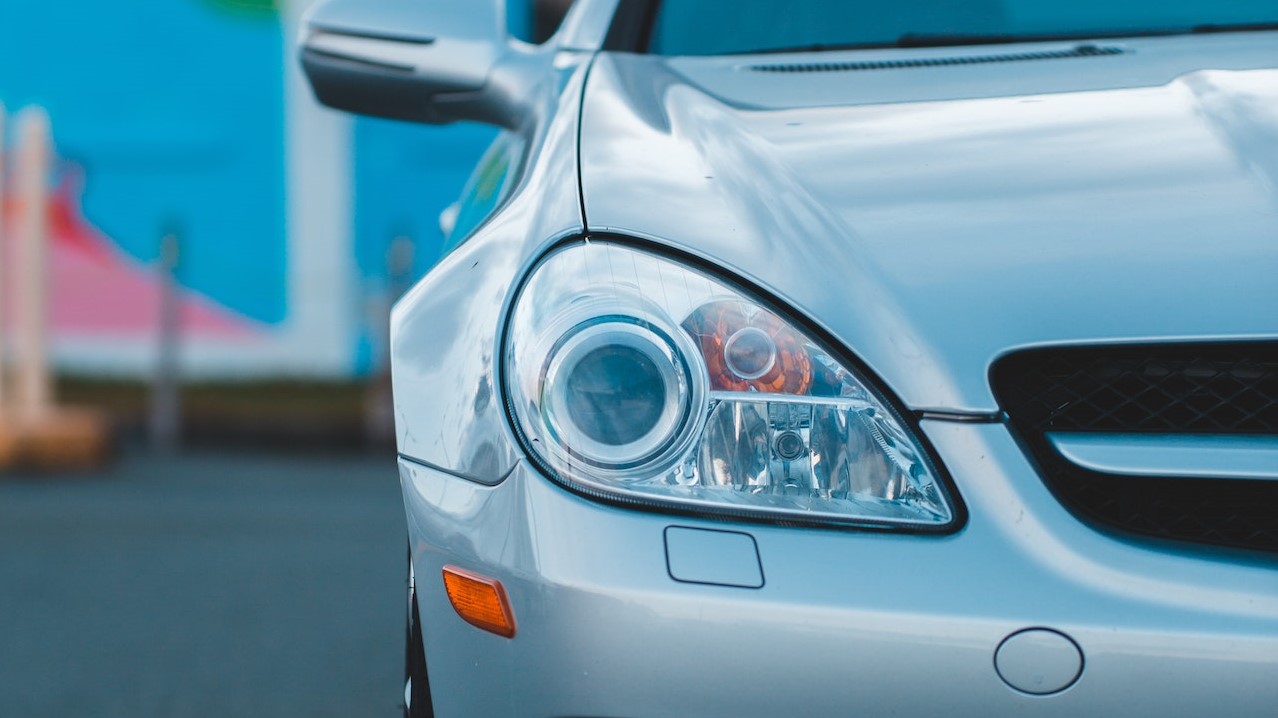 Stylish coupe car parked on street | Goodwill Car Donations