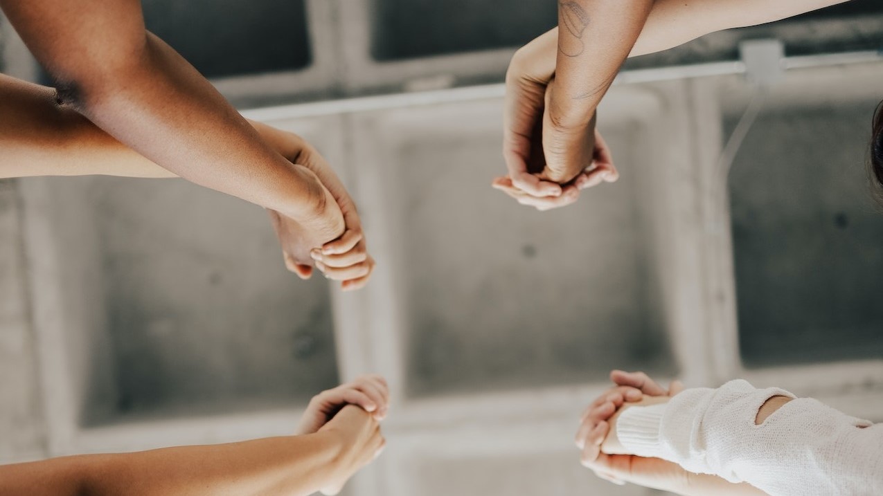 hands holding of people | Goodwill Car Donations