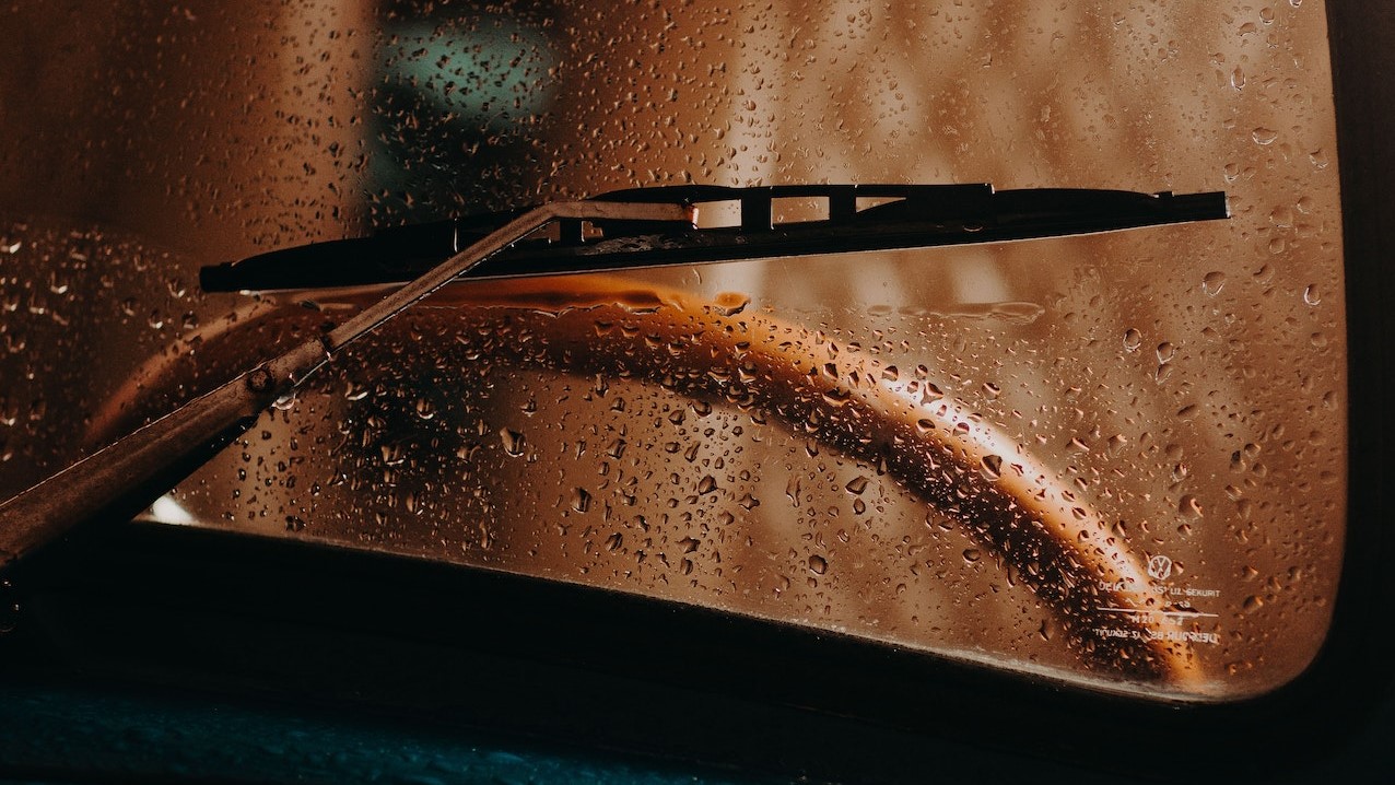 Close-up of Wet Exterior of a Car | Goodwill Car Donations