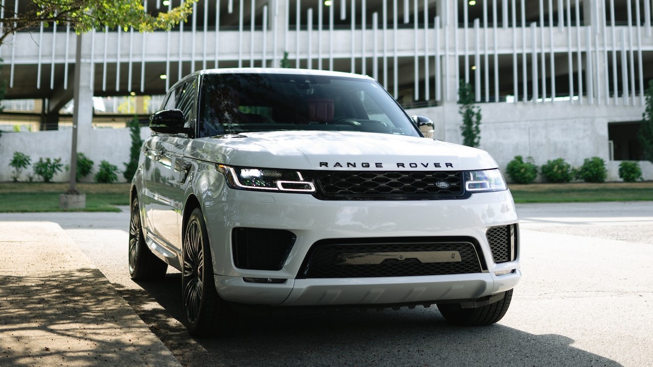 White Range Rover Parked Under the Tree | Goodwill Car Donations