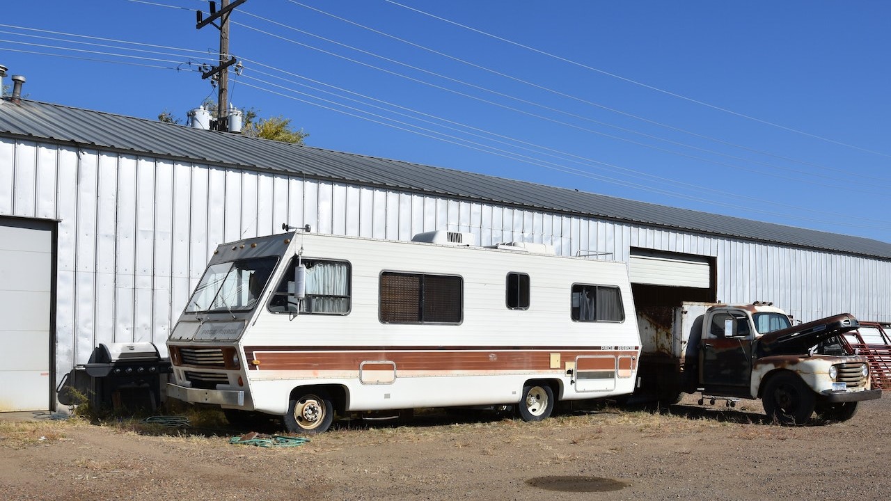 Vintage Mobile RV Parked on Dirt Road | Goodwill Car Donations