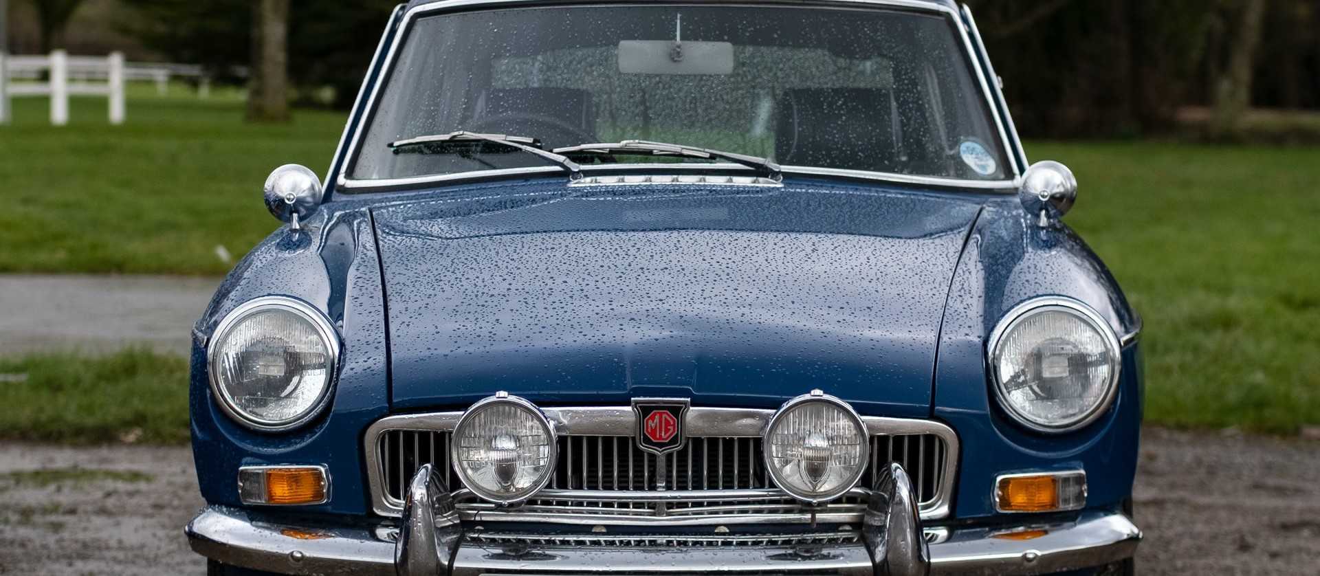Blue Oldtimer Car in a Rainy Day | Goodwill Car Donations