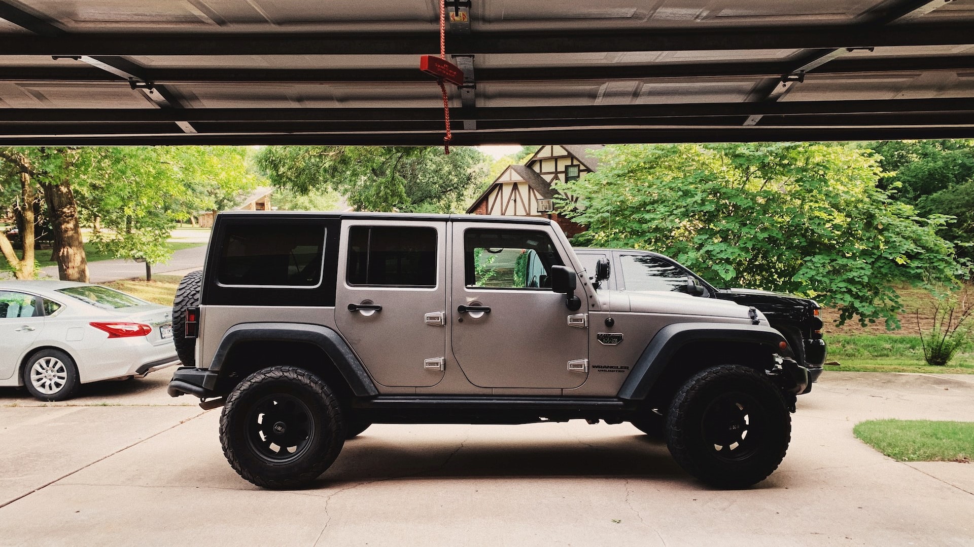 Gray Wrangler in a garage | Goodwill Car Donations