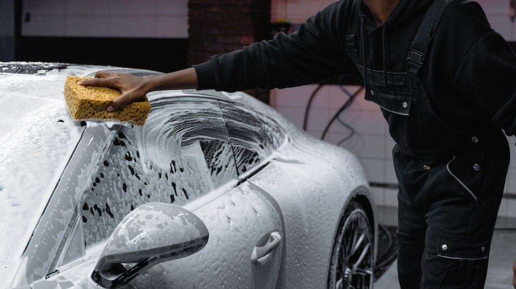 A Man Washing a Car | Goodwill Car Donations