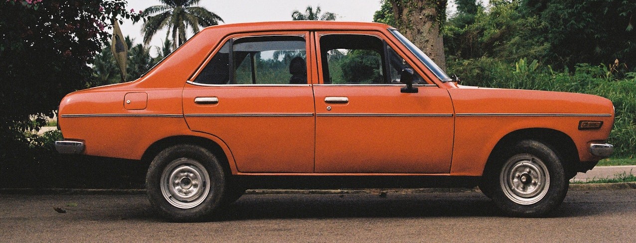 Old Orange Car | Goodwill Car Donations