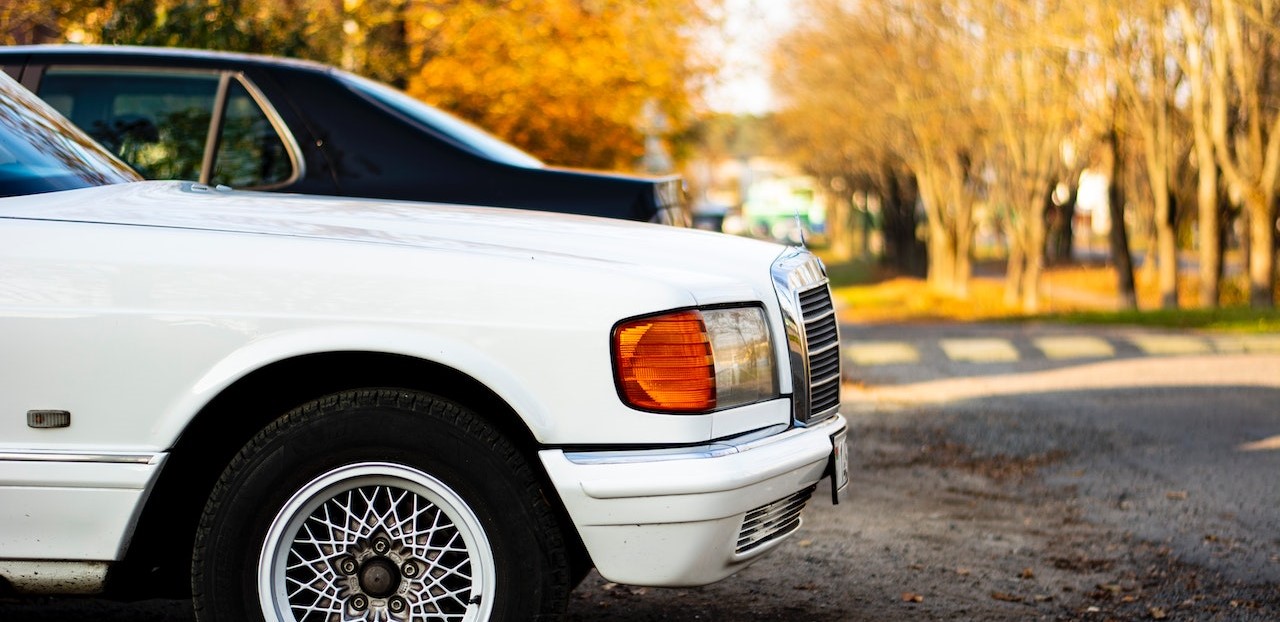 White Car Parked on the Street Side | Goodwill Car Donations