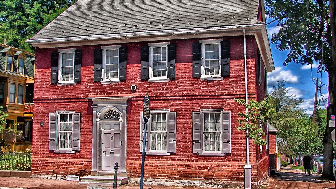 A red colonial house in lancaster | Goodwill Car Donations