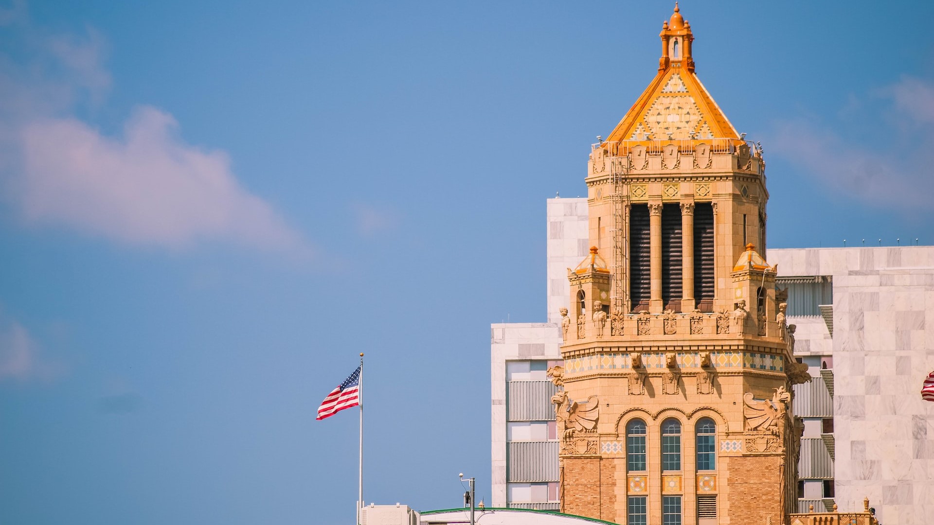 Building in Rochester with flag | Goodwill Car Donations