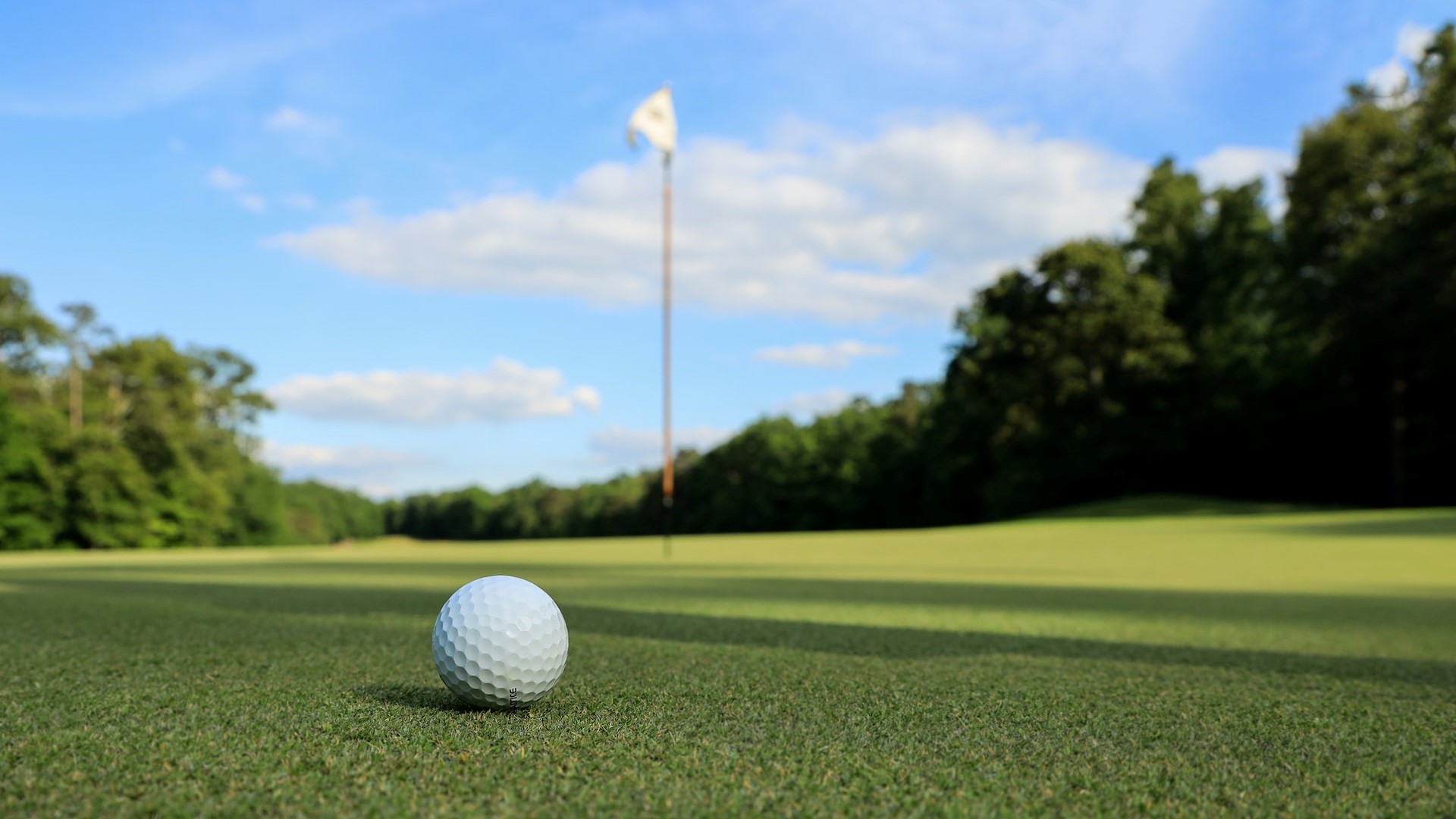 Golf ball near a pole | Goodwill Car Donations