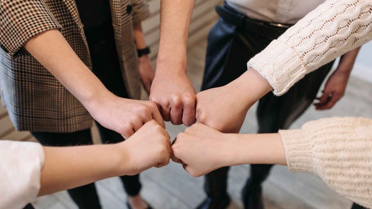 Group of People Showing Teamwork and Unity | Goodwill Car Donations