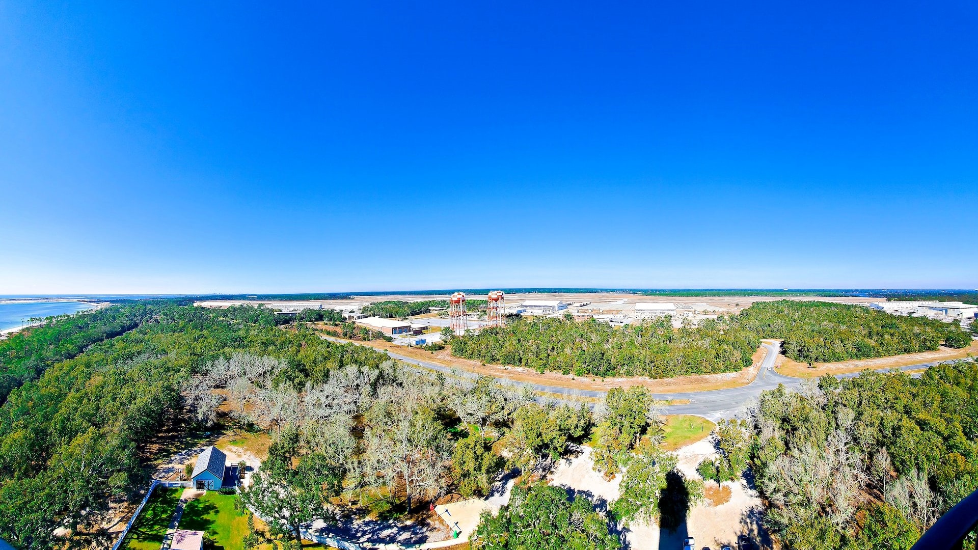 Pensacola lighthouse overlooking a the beach and the Gulf of Mexico with a panoramic view from the top of the lighthouse | Goodwill Car Donations