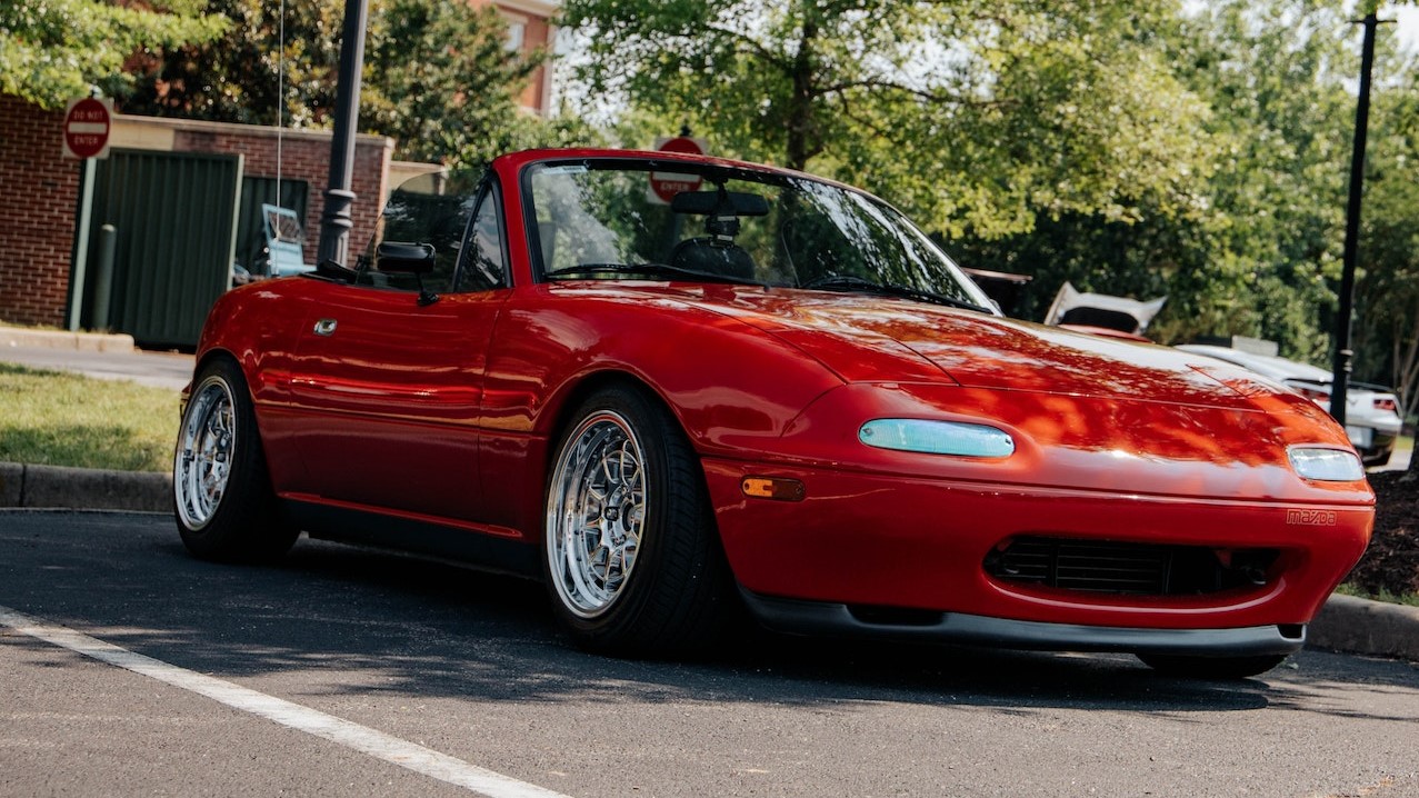 Red Convertible Car Parked on Parking Area | Goodwill Car Donations