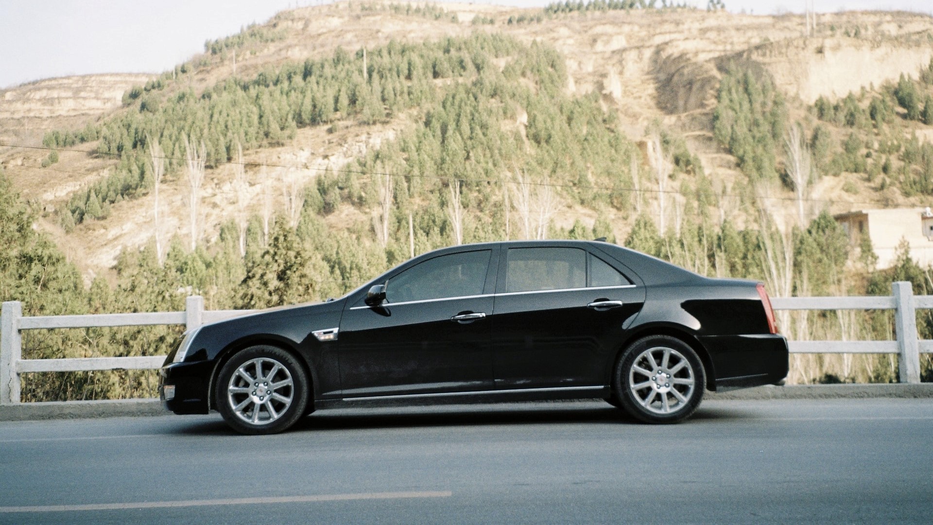 Sedan parked near mountain | Goodwill Car Donations