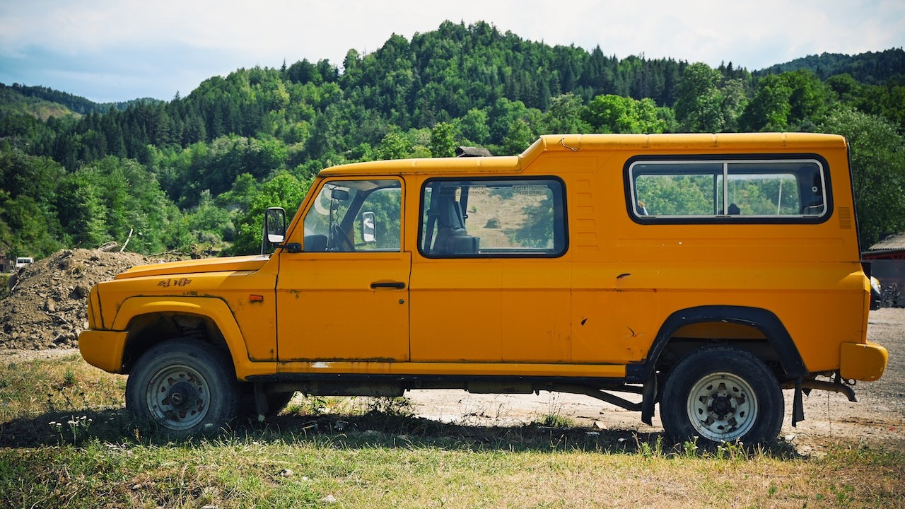 Side of a Yellow Truck | Goodwill Car Donations