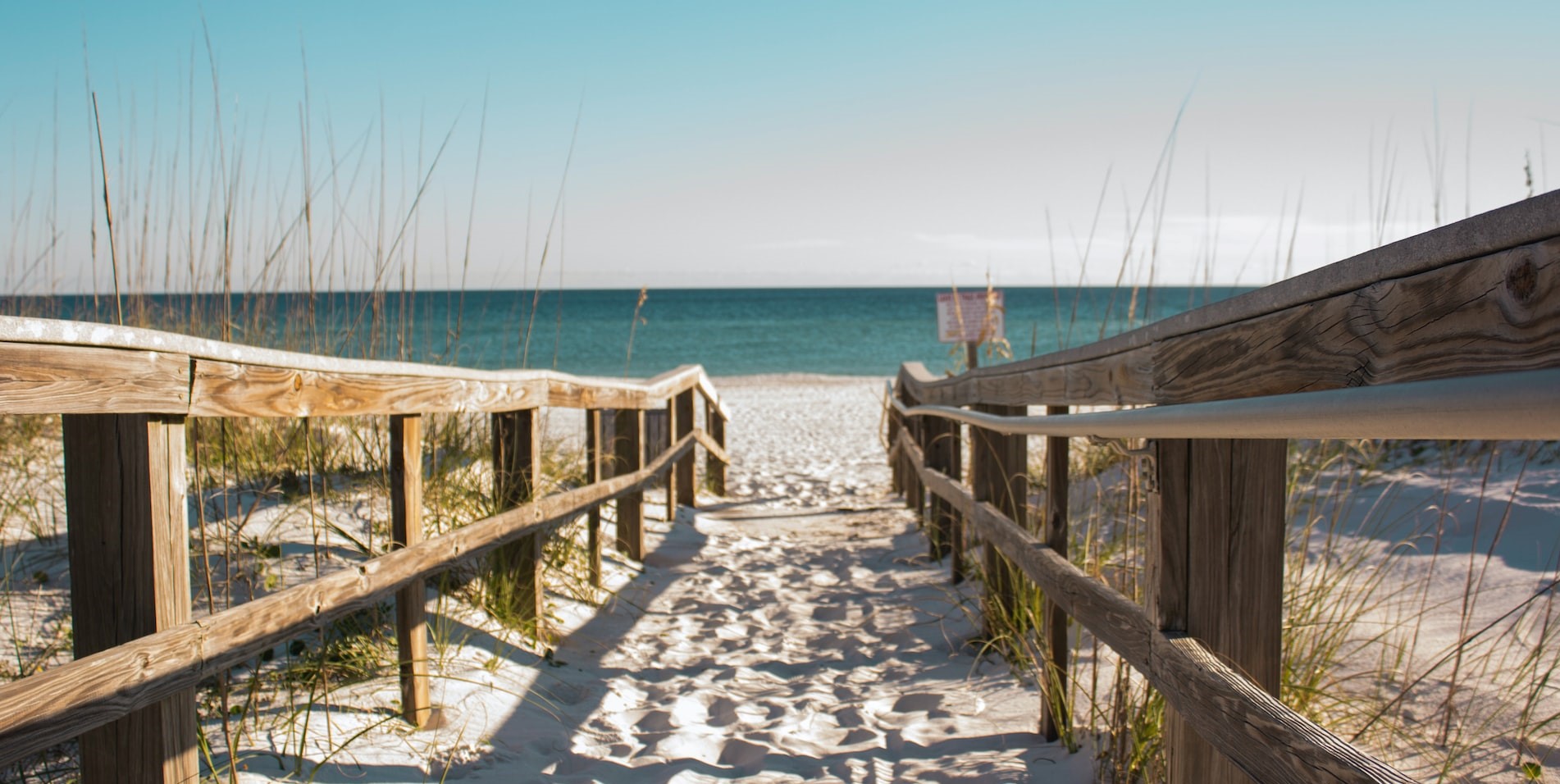 Wooden Fence Towards the Ocean | Goodwill Car Donations 