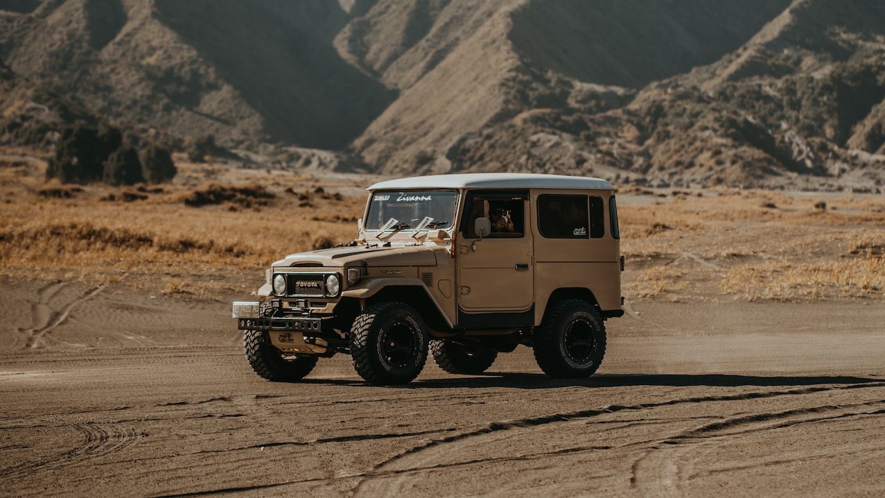 Wrangler on Dirt Road | Goodwill Car Donations