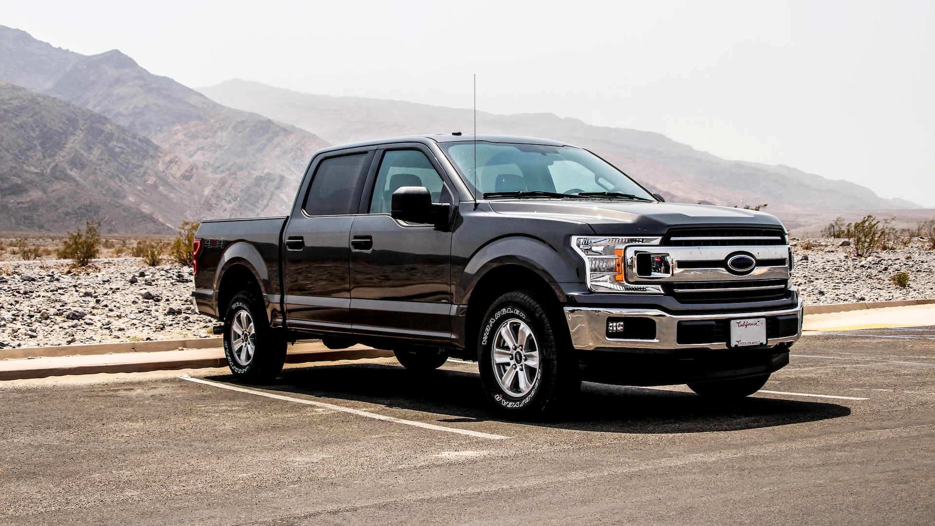 parked black crew-can pickup truck photo | Goodwill Car Donations