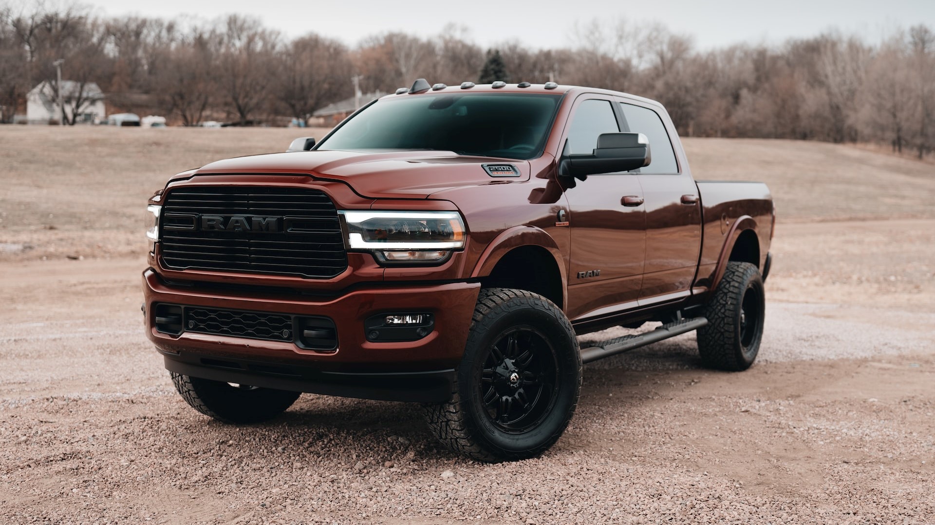 red chevrolet crew cab pickup truck on dirt road during daytime photo | Goodwill Car Donations