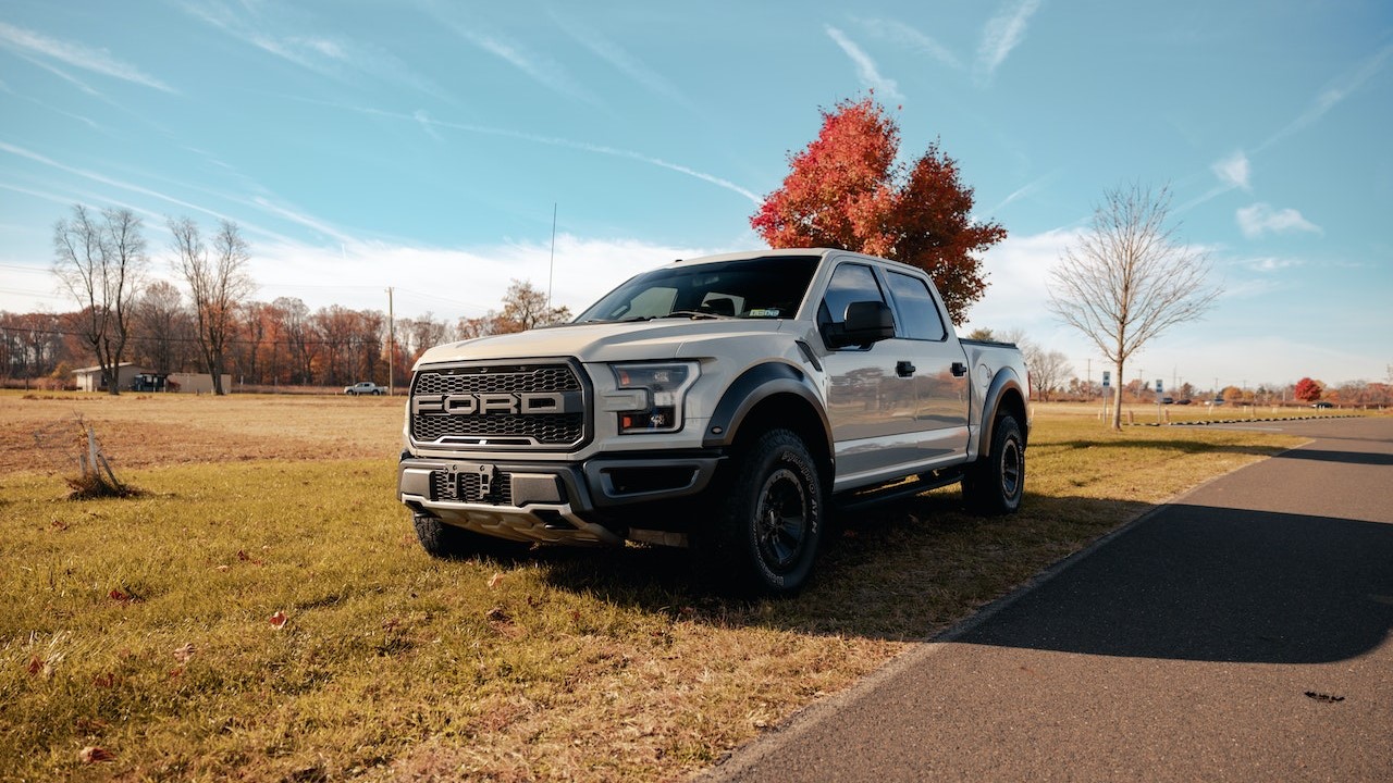 Parked White Ford Pick-up | Goodwill Car Donations
