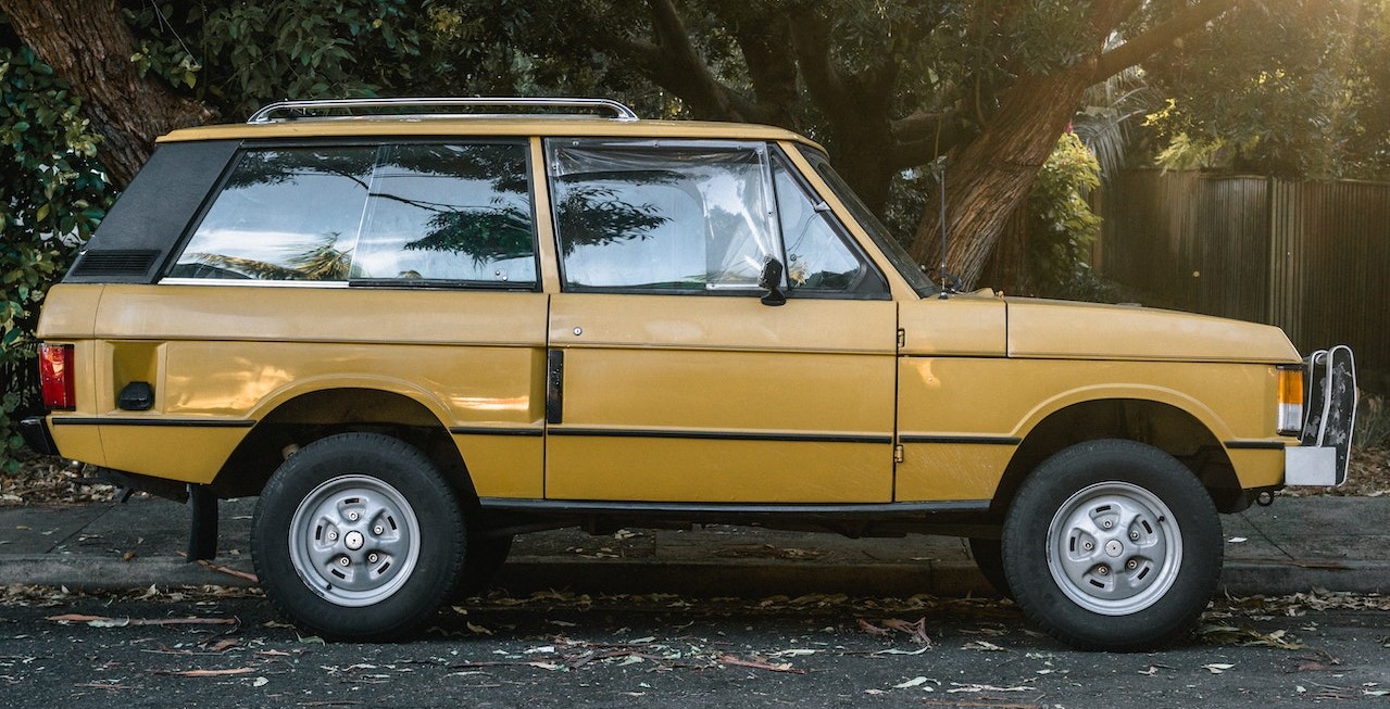 Photo of Parked Yellow SUV | Goodwill Car Donations