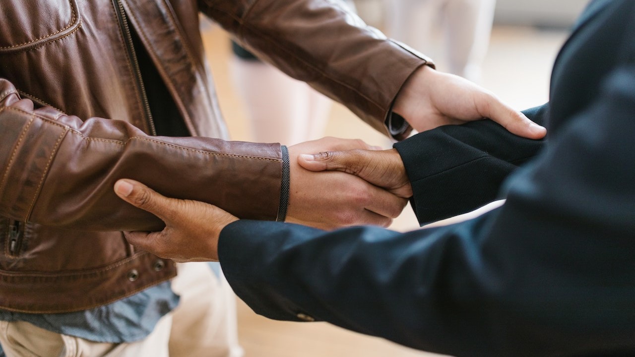 Shaking Hand with a Person | Goodwill Car Donations