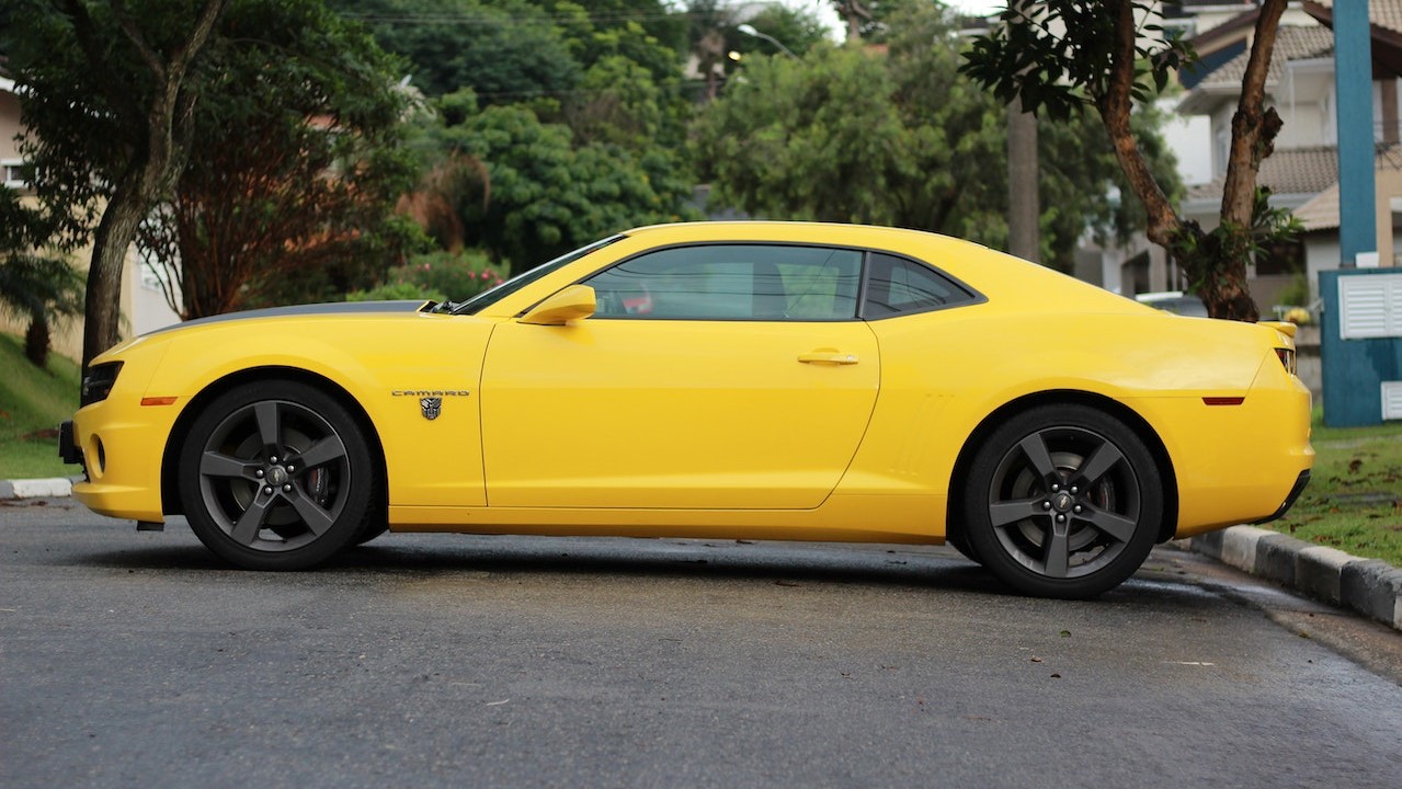 Side View of a Yellow Camaro | Goodwill Car Donations