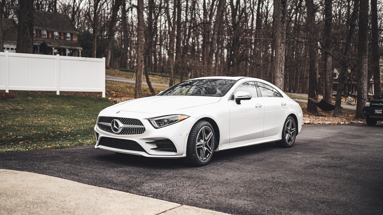 White mercedes-benz parked | Goodwill Car Donations