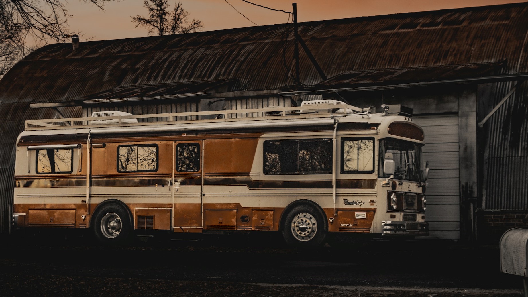 a bus parked in front of a building photo | Goodwill Car Donations