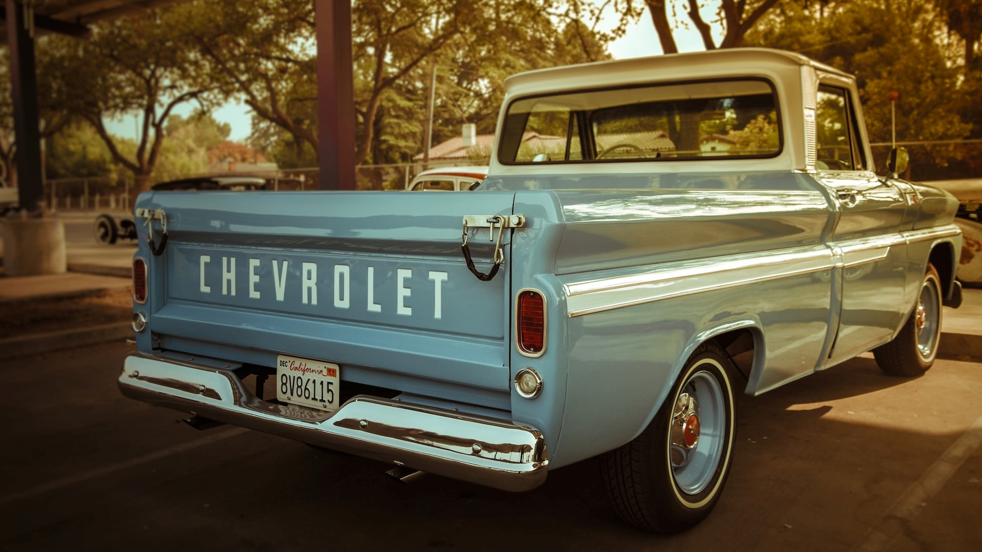 white chevrolet single cab pickup truck parked on road | Goodwill Car Donations