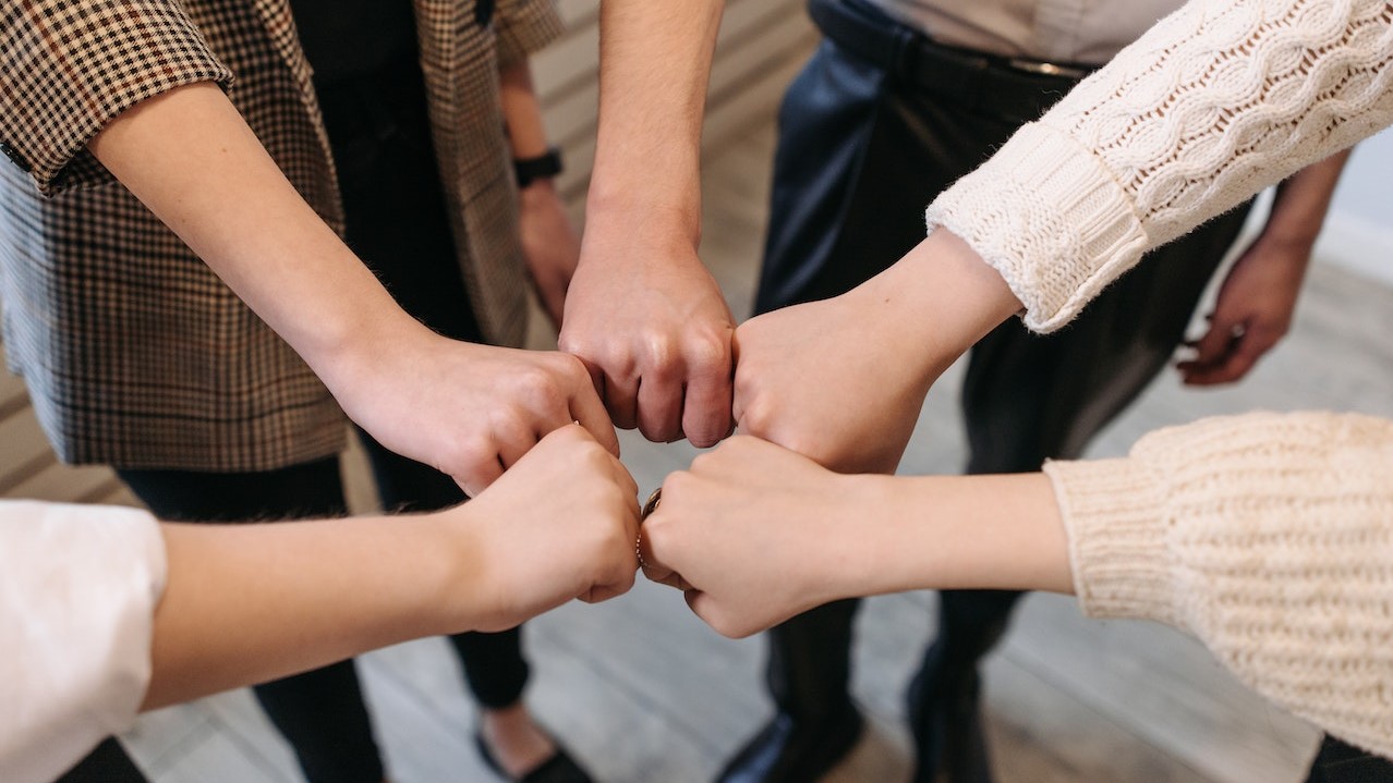 Group of People Showing Teamwork and Unity | Goodwill Car Donations