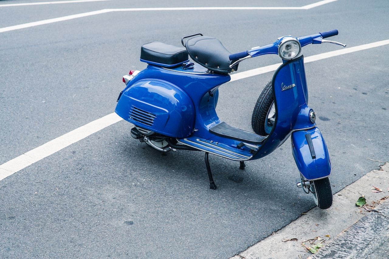 Parked Blue Motor Scooter | Goodwill Car Donations