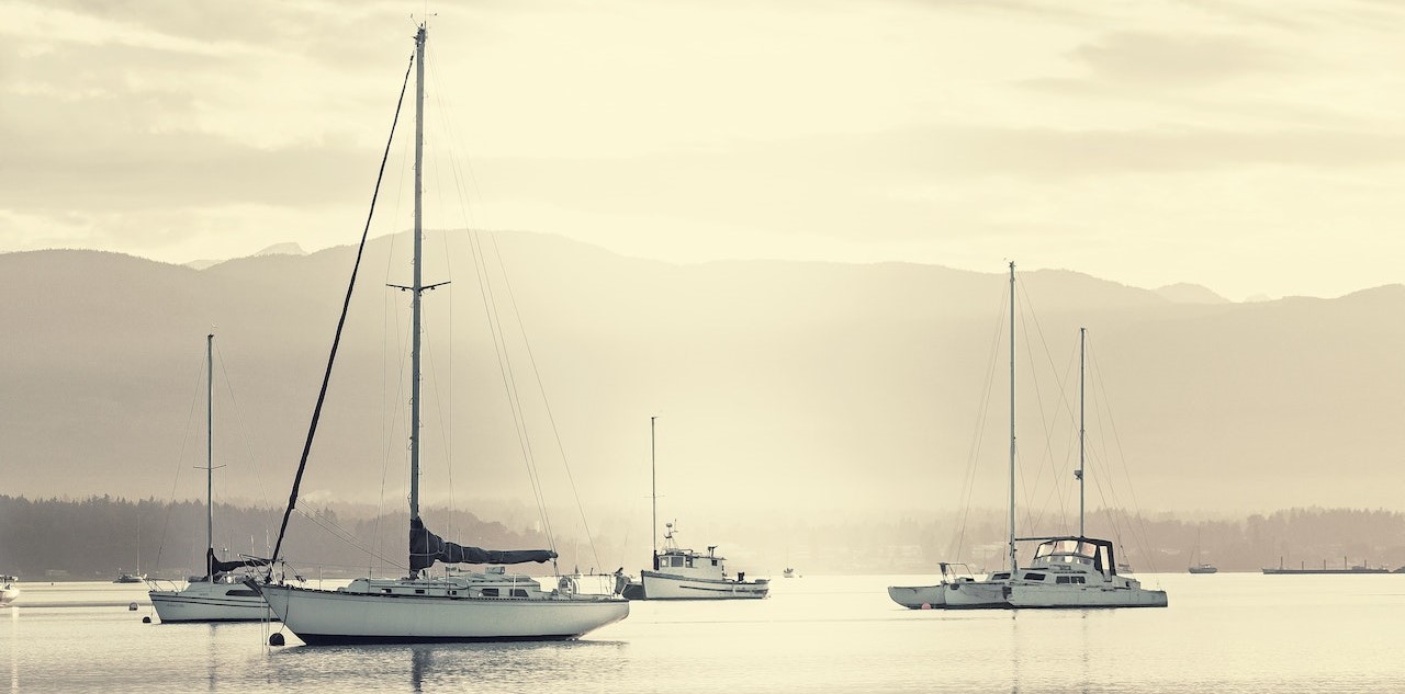 Sailboats Sailing on Sea Against Sky | Goodwill Car Donations