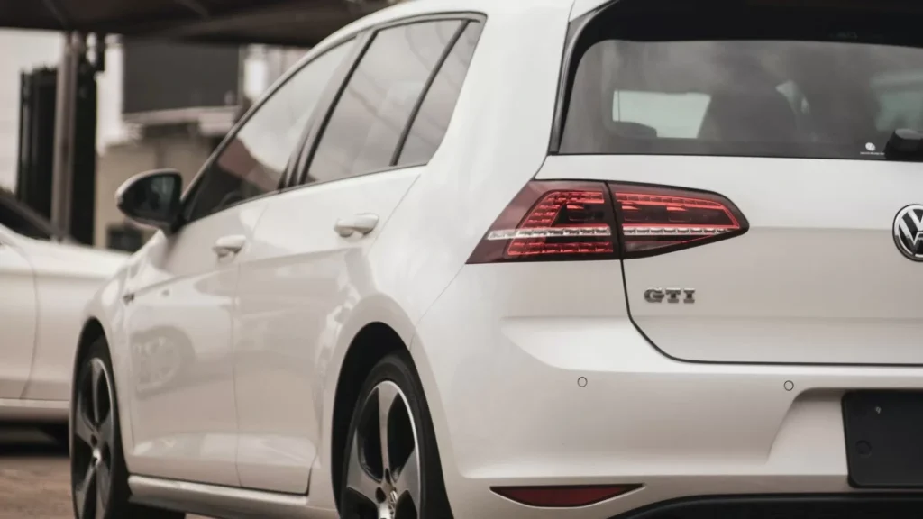 A Volkswagen Golf Mk 7 GTI parked in a parking lot