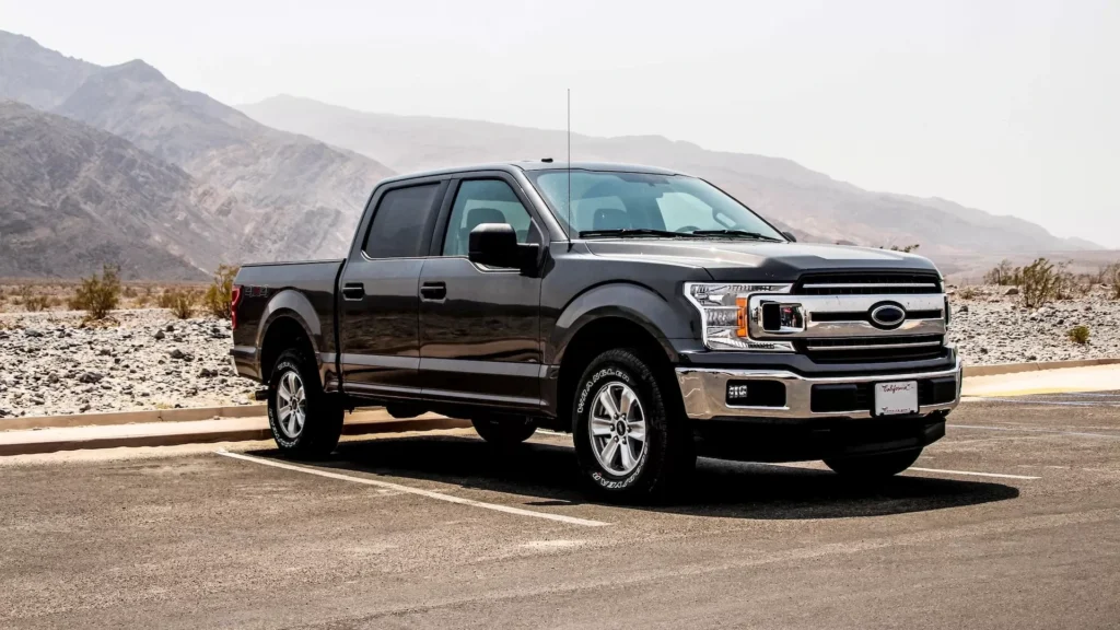 Parked black crew-can pickup truck