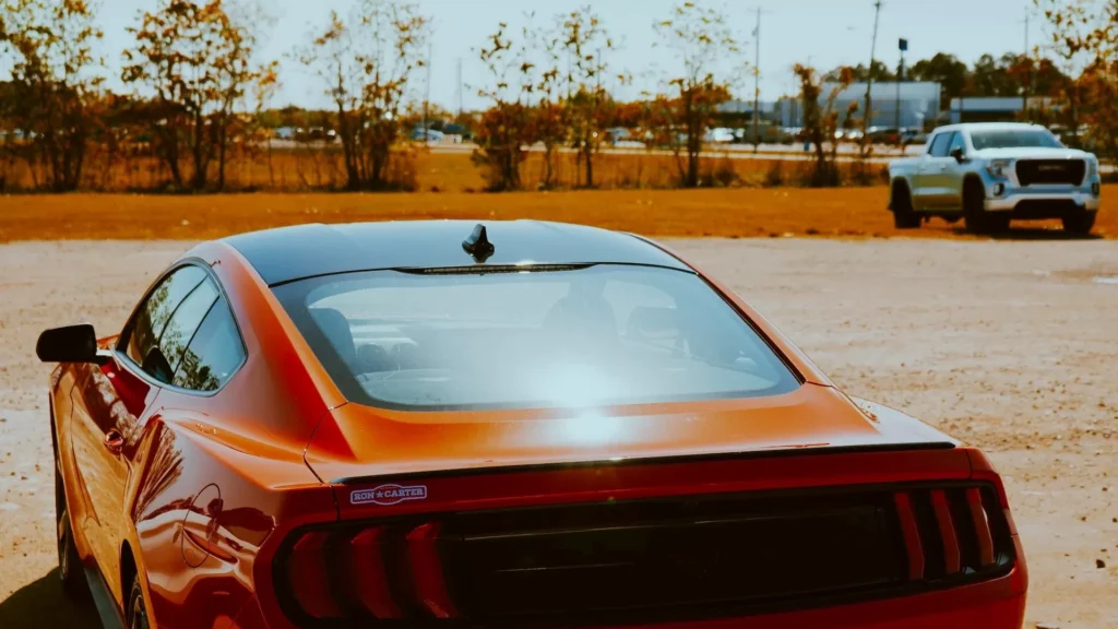 red audi r 8 on road during daytime