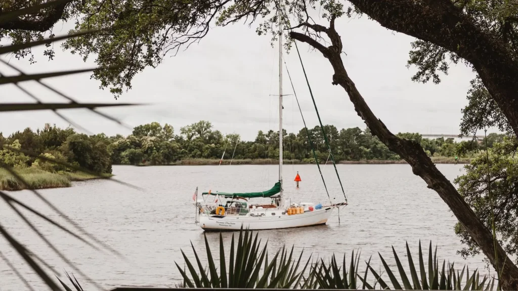 White boat on body of water during daytime